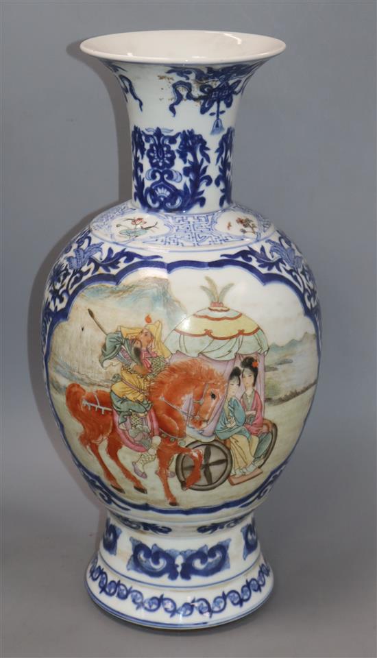 A Chinese blue and white baluster vase, with a polychrome painted panel height 47cm
